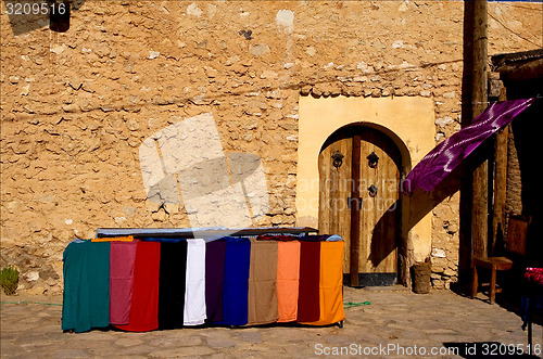 Image of door market and clothes in tamerza tunisia