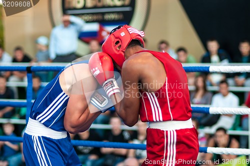 Image of A boxing match Osleys Iglesias, Cuba and Salah Mutselkhanov, Russia. Victory Osleys Iglesias