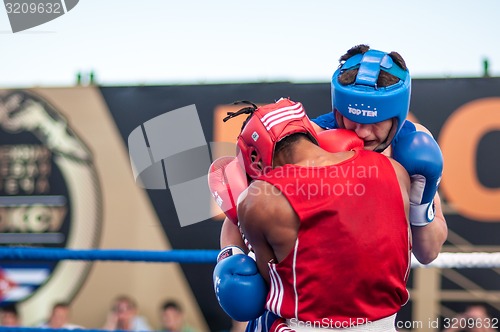 Image of A boxing match Osleys Iglesias, Cuba and Salah Mutselkhanov, Russia. Victory Osleys Iglesias