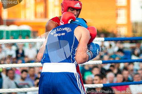 Image of A boxing match Osleys Iglesias, Cuba and Salah Mutselkhanov, Russia. Victory Osleys Iglesias