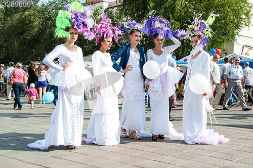 Image of The girl at the celebration of the city