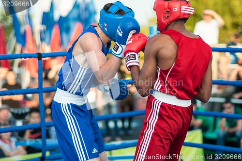 Image of A boxing match Osleys Iglesias, Cuba and Salah Mutselkhanov, Russia. Victory Osleys Iglesias