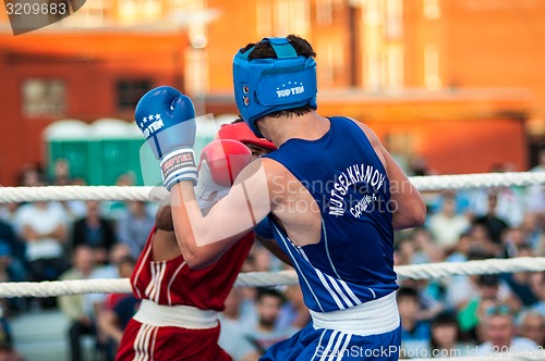 Image of A boxing match Osleys Iglesias, Cuba and Salah Mutselkhanov, Russia. Victory Osleys Iglesias