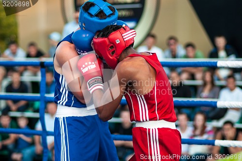 Image of A boxing match Osleys Iglesias, Cuba and Salah Mutselkhanov, Russia. Victory Osleys Iglesias