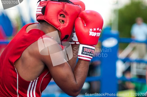 Image of A boxing match Osleys Iglesias, Cuba and Salah Mutselkhanov, Russia. Victory Osleys Iglesias