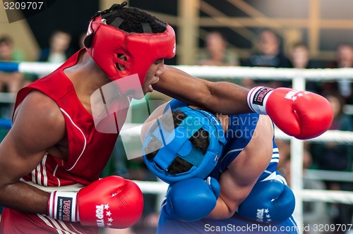 Image of A boxing match Osleys Iglesias, Cuba and Salah Mutselkhanov, Russia. Victory Osleys Iglesias