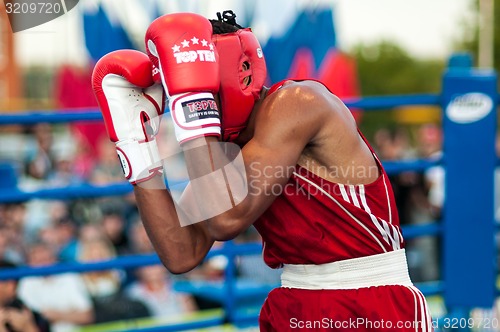 Image of A boxing match Osleys Iglesias, Cuba and Salah Mutselkhanov, Russia. Victory Osleys Iglesias