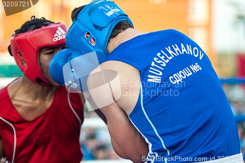 Image of A boxing match Osleys Iglesias, Cuba and Salah Mutselkhanov, Russia. Victory Osleys Iglesias