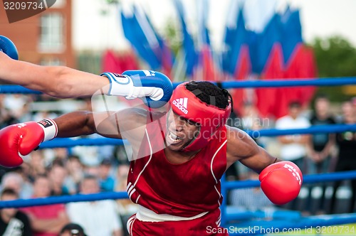 Image of A boxing match Osleys Iglesias, Cuba and Salah Mutselkhanov, Russia. Victory Osleys Iglesias