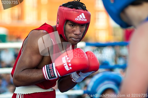 Image of A boxing match Osleys Iglesias, Cuba and Salah Mutselkhanov, Russia. Victory Osleys Iglesias