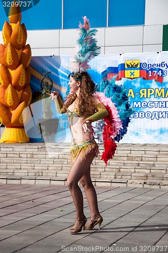 Image of The girl at the celebration of the city