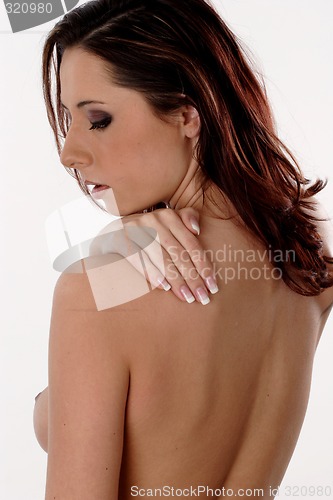 Image of Woman rubbing shoulder