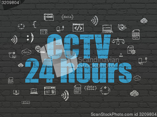 Image of Safety concept: CCTV 24 hours on wall background