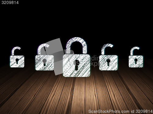 Image of Safety concept: closed padlock icon in grunge dark room
