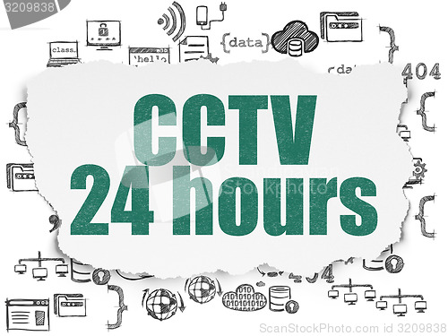 Image of Privacy concept: CCTV 24 hours on Torn Paper background