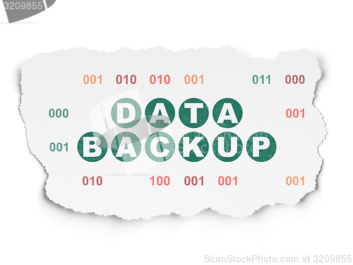 Image of Information concept: Data Backup on Torn Paper background