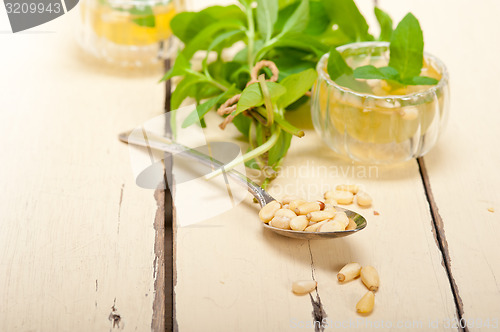 Image of Arab traditional mint and pine nuts tea