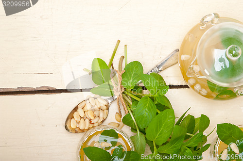 Image of Arab traditional mint and pine nuts tea