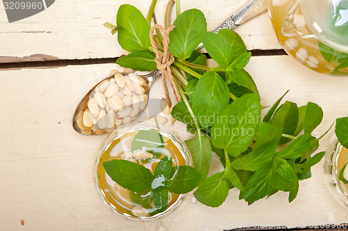 Image of Arab traditional mint and pine nuts tea