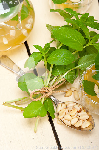 Image of Arab traditional mint and pine nuts tea