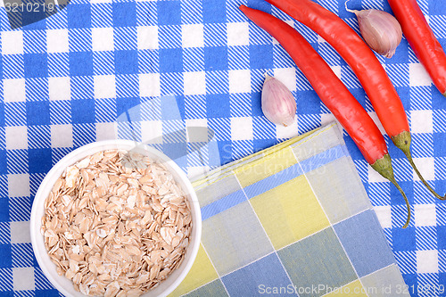 Image of bowl of corn flakes and red pepper