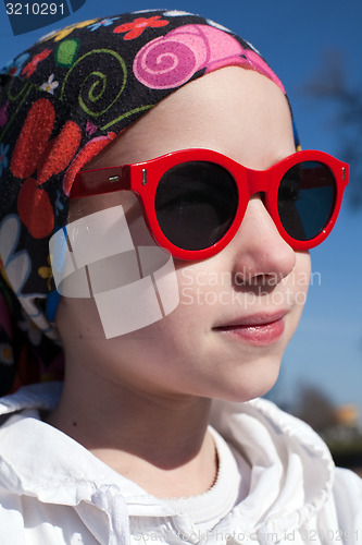 Image of young girl in sunglasses