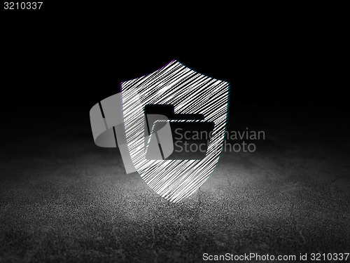 Image of Finance concept: Folder With Shield in grunge dark room