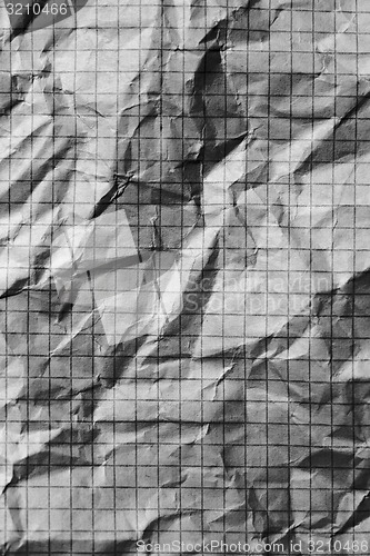 Image of crumpled checkered paper. macro photo