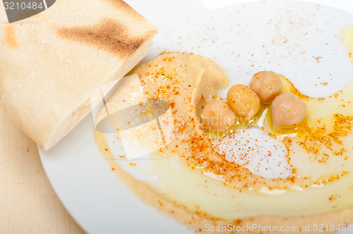 Image of Hummus with pita bread 