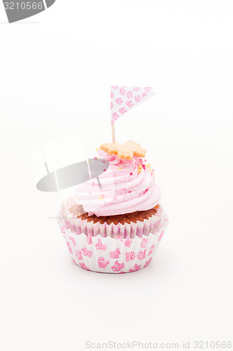 Image of  one beautiful pink and violet cupcake 