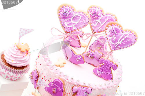 Image of pink and violet girl\'s birthday cake