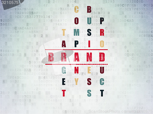 Image of Marketing concept: word Brand in solving Crossword Puzzle