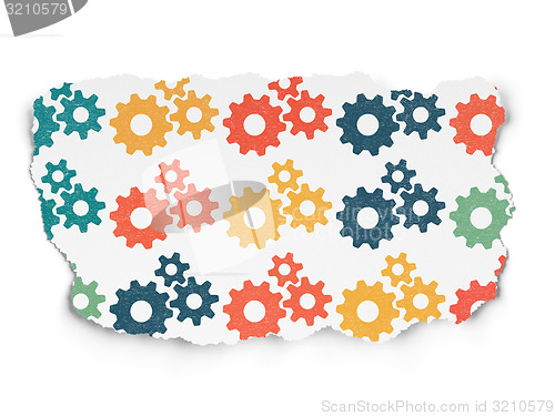 Image of Marketing concept: Gears icons on Torn Paper background