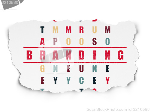Image of Advertising concept: word Branding in solving Crossword Puzzle