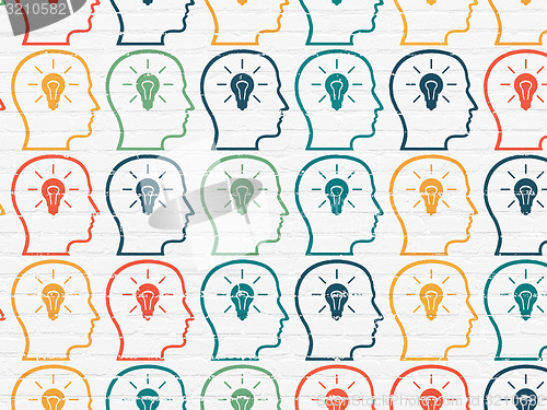 Image of Marketing concept: Head With Lightbulb icons on wall background