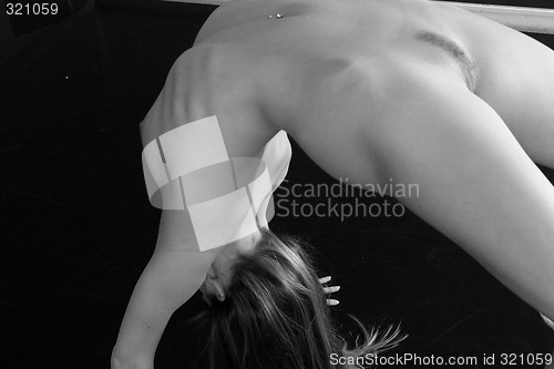 Image of Nude ballerina practicing 