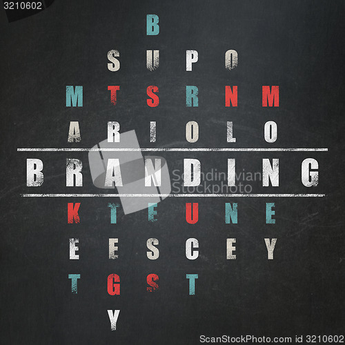 Image of Marketing concept: word Branding in solving Crossword Puzzle