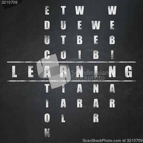 Image of Education concept: word Learning in solving Crossword Puzzle