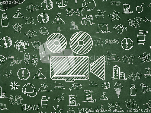 Image of Travel concept: Camera on School Board background