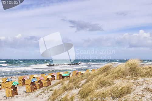 Image of Beach chairs with dunes at Wustrow