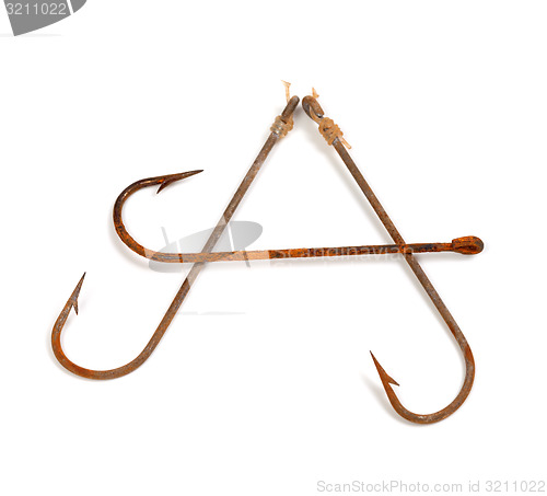 Image of Letter A composed of old rusty fish hooks