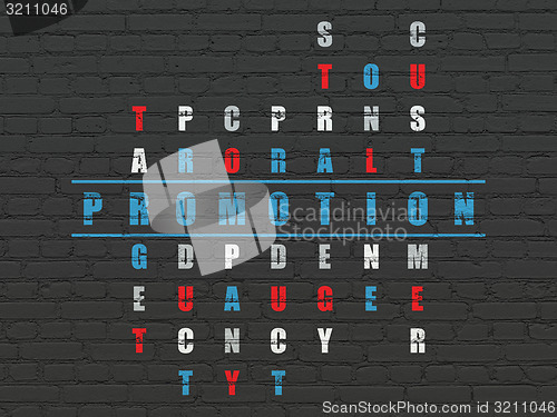 Image of Marketing concept: word Promotion in solving Crossword Puzzle