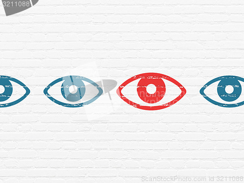 Image of Privacy concept: eye icon on wall background
