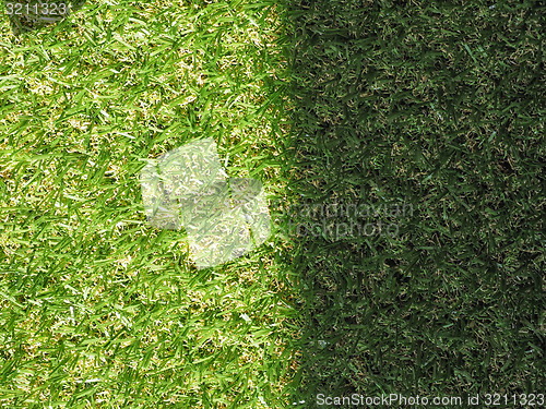 Image of Green artificial synthetic grass meadow background