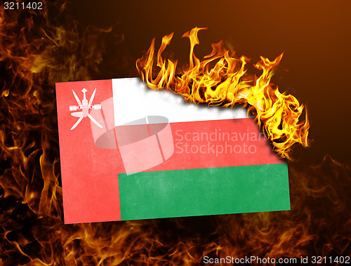 Image of Flag burning - Oman