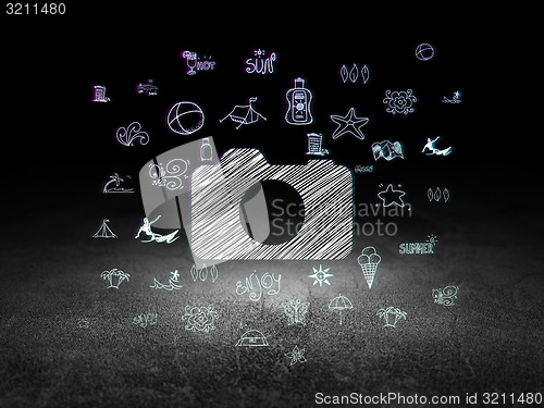 Image of Tourism concept: Photo Camera in grunge dark room