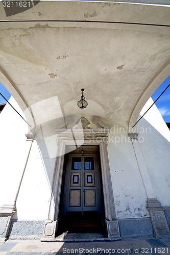 Image of europe  italy  lombardy        the milano    church  door  brick