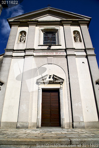 Image of  church  in    sumirago old   closed brick tower sidewalk italy 