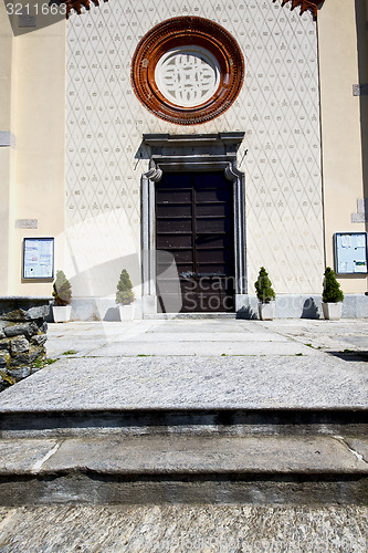 Image of  lombardy    in  the crugnola old     brick tower sidewal 