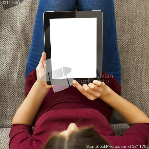 Image of Woman using a digital tablet